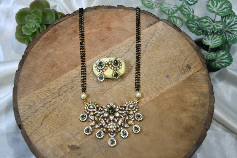 Long 2 Line Black Beads with Polki Pendant and Earrings in Pink and Green Colour NFBB09