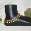 Antique flower pearl hanging anklets with vintage floral motif and pearl drops by Nischala Fashions.