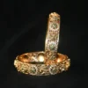 Peacock CZ 2pc bangles with traditional design and sparkling cubic zirconia stones by nischala fashions