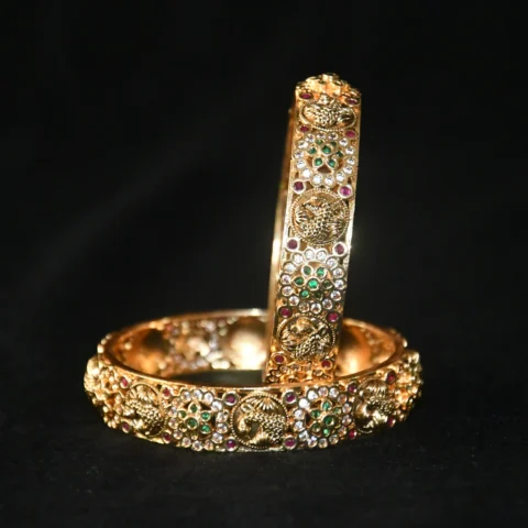 Peacock CZ 2pc bangles with traditional design and sparkling cubic zirconia stones by nischala fashions