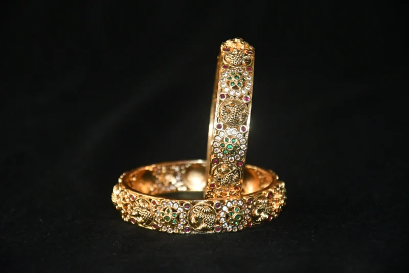 Peacock CZ 2pc bangles with traditional design and sparkling cubic zirconia stones by nischala fashions
