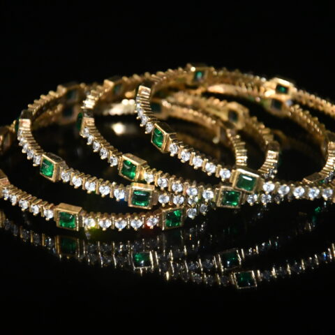 Victorian 4pc green bangles on wrist