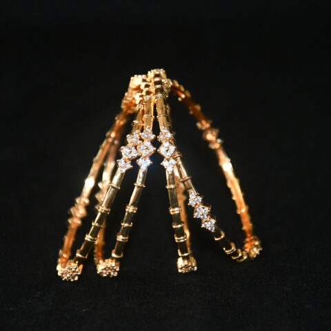 Bamboo model gold cz 4pc bangles on wrist