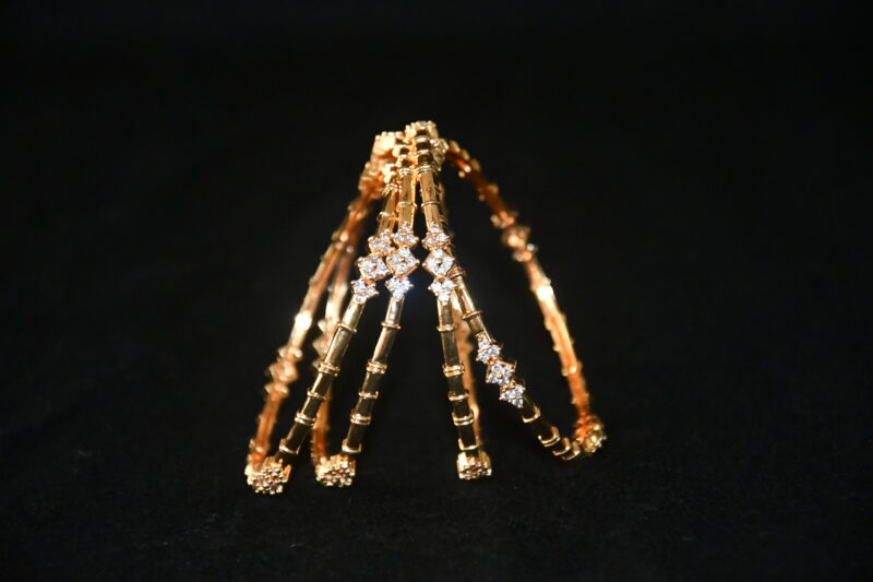 Bamboo model gold cz 4pc bangles on wrist