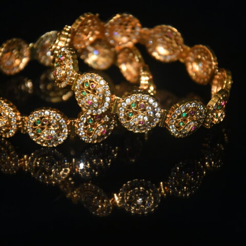 Cz round peacock 2pc bangles on wrist