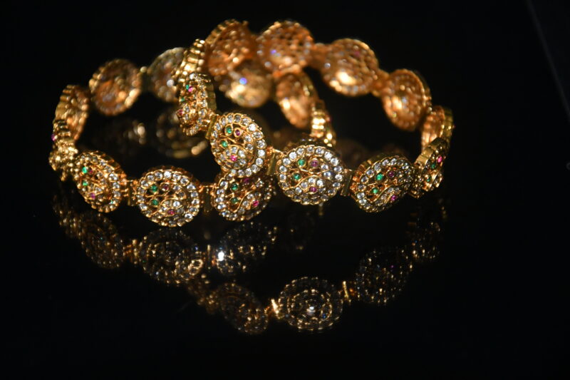 Cz round peacock 2pc bangles on wrist