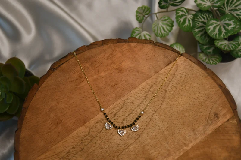3Hearts Simple Black Beads necklace with heart motifs and gold finish by nischala fashions