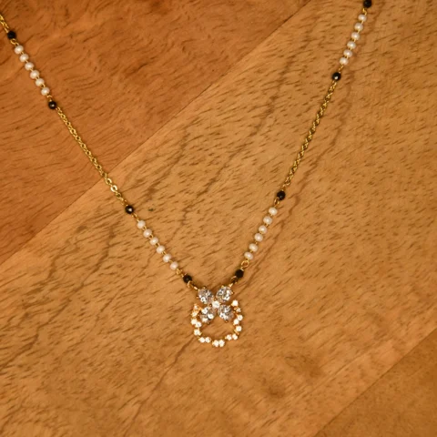 Pearl Flower Simple Black Beads chain with floral pearl design and gold finish by nischala fashions