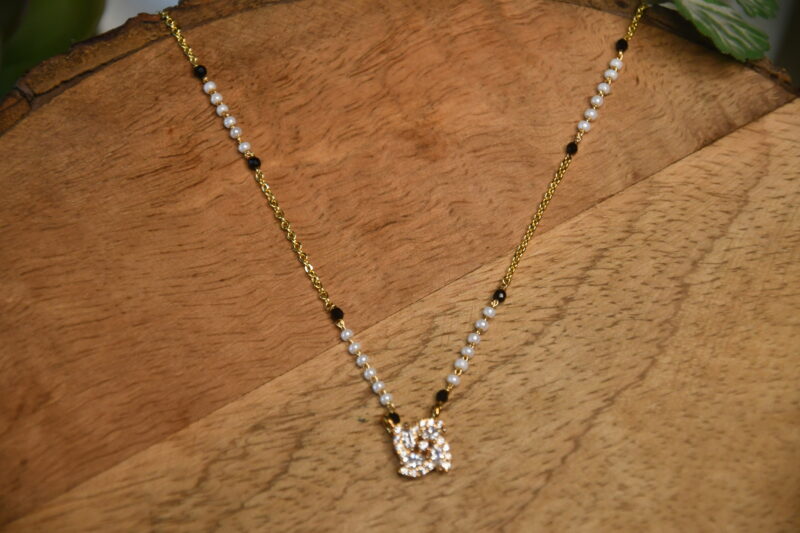 pearl spiral flower simple blackbeads by Nischala Fashions