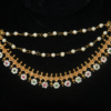 Round Flower CZ Pearl Champasavaralu earchain with floral cubic zirconia design and pearl hangings by nischala fashions