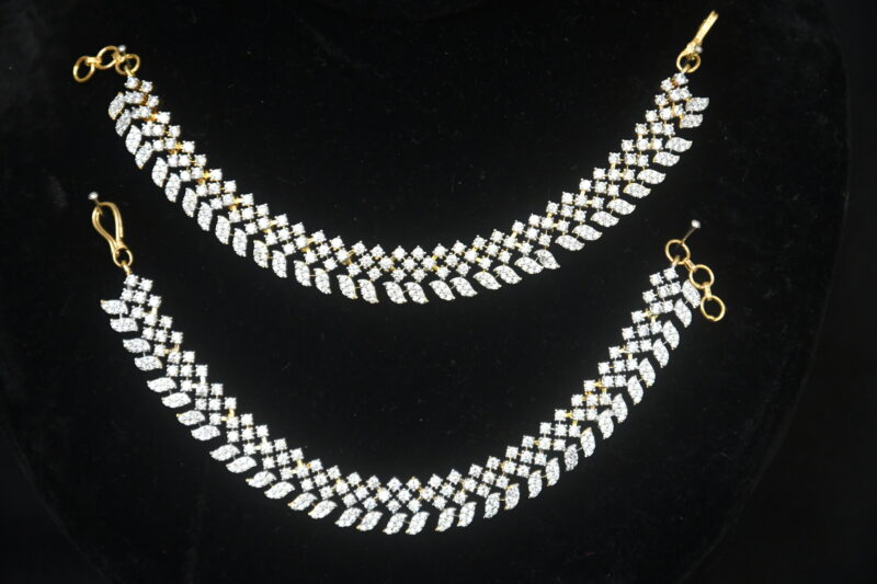 Diamond single line champasavaralu/earchain by Nischala Fashions