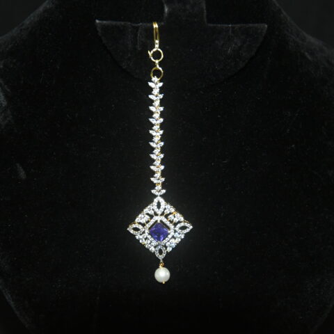 Diamond square violet maang tikka with single pearl hanging, festive Indian jewelry by Nischala Fashions.