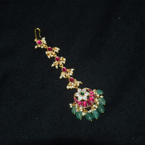 Jadau kundan flower moon maang tikka with green beads hanging, bridal statement jewelry by Nischala Fashions.