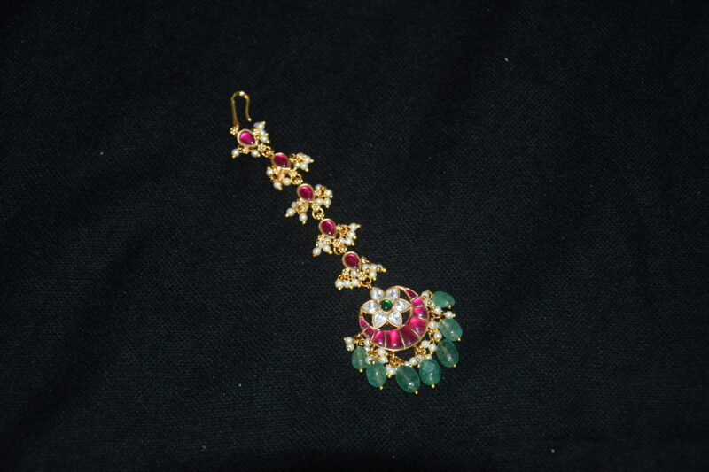 Jadau kundan flower moon maang tikka with green beads hanging, bridal statement jewelry by Nischala Fashions.