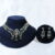 Feather model necklace with earrings