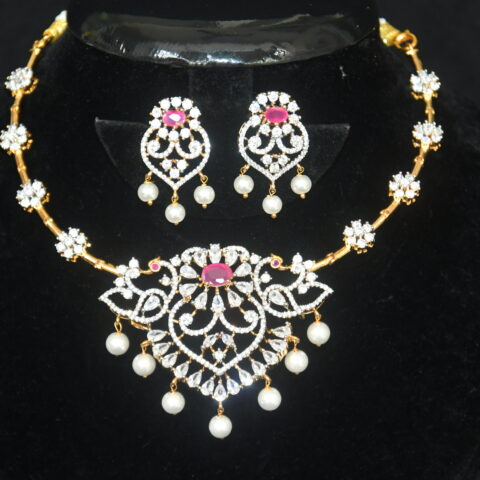 Diamond pink kante necklace with earrings, kante-style necklace with dazzling diamonds and pink stones by Nischala Fashions.