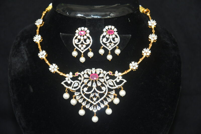 Diamond pink kante necklace with earrings, kante-style necklace with dazzling diamonds and pink stones by Nischala Fashions.