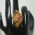 Antique Peacock Finger Ring with pink CZ stones and gold finish by nischala fashions