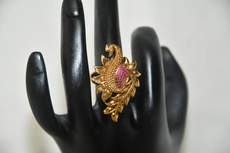 Antique Peacock Finger Ring with pink CZ stones and gold finish by nischala fashions
