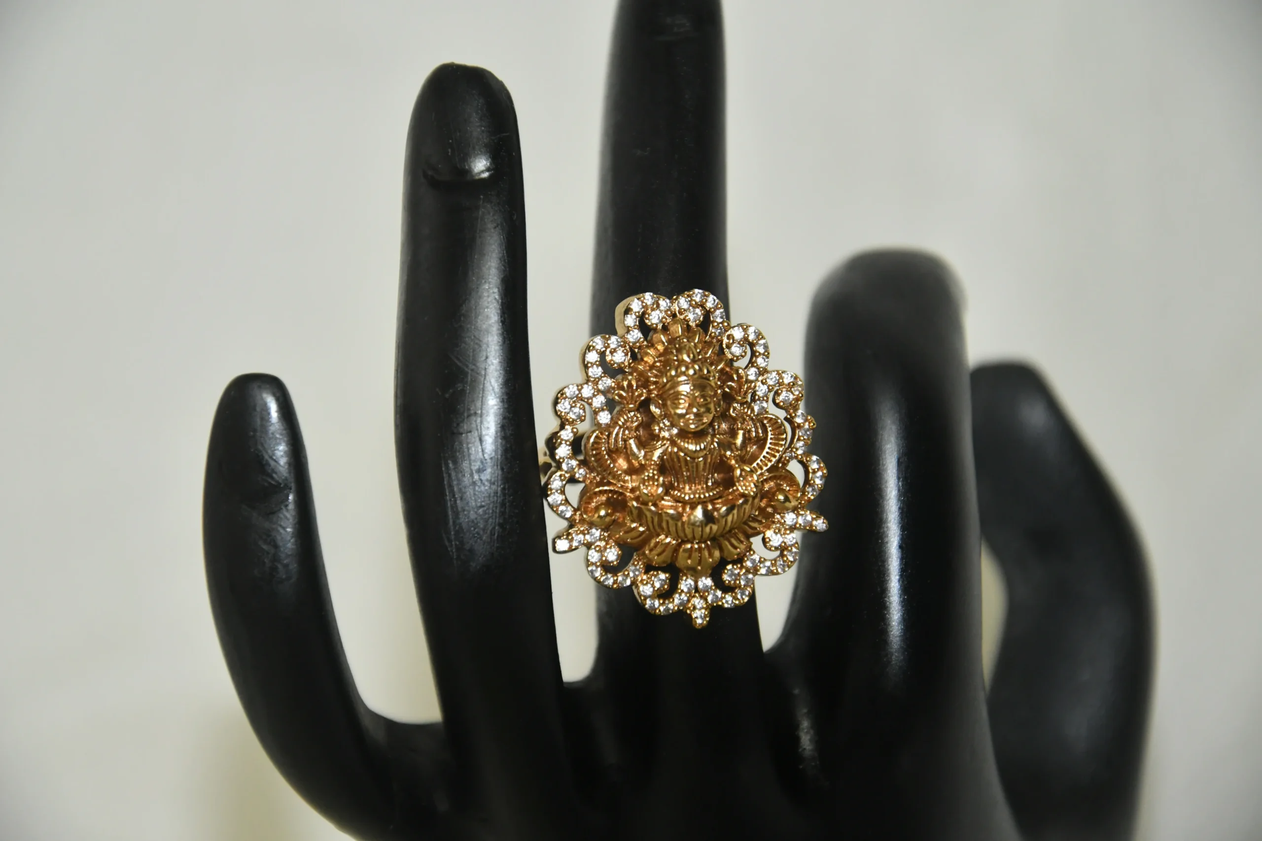 Antique Lakshmi Finger Ring with CZ stones and gold finish by nischala fashions