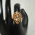Antique Peacock Finger Ring with intricate temple design in gold finish by nischala fashions