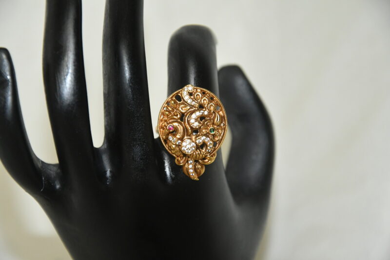 Antique Peacock Finger Ring with intricate temple design in gold finish by nischala fashions