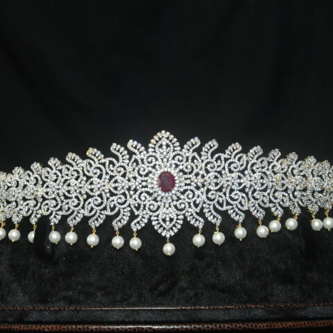 Diamond pink stone waistbelt with pearl hanging by Nischala Fashions