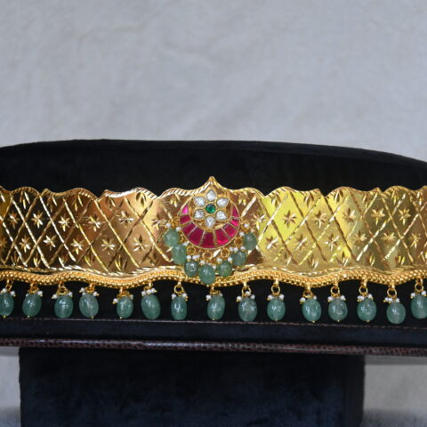 Real gold look waistbelt with jadau kundan pendant by Nischala Fashions